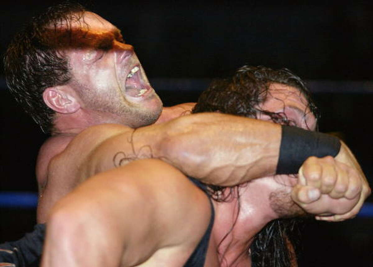 Wrestler Chris Benoit slays family, himself.