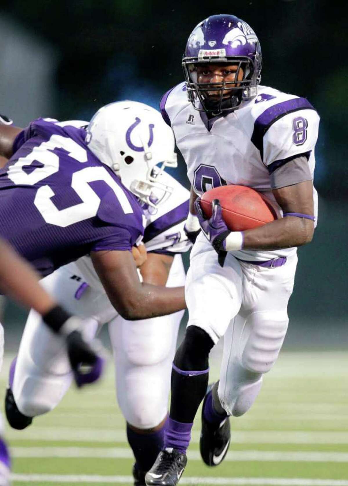 Angleton's Ryan Jackson moves the ball upfield in the first half of a high school football game between Angleton and Dayton at Bronco Stadium on Friday, Sept. 10, 2010, in Dayton. ( Julio Cortez / Houston Chronicle )