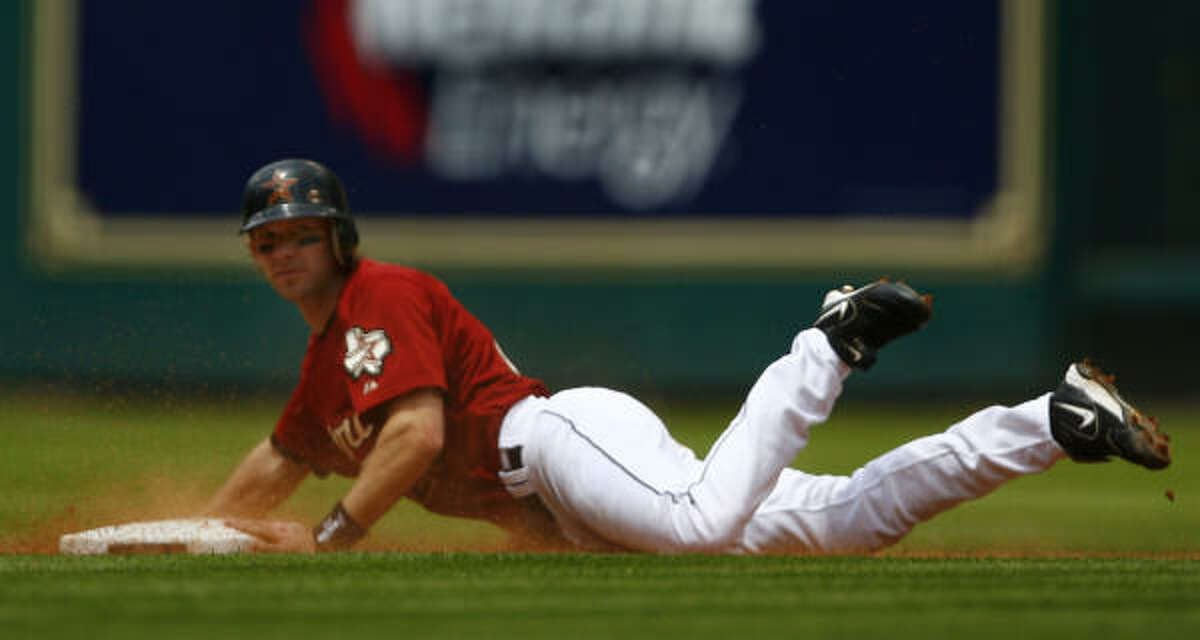 The Astros' Adam Everett safely steals second in the fourth inning.