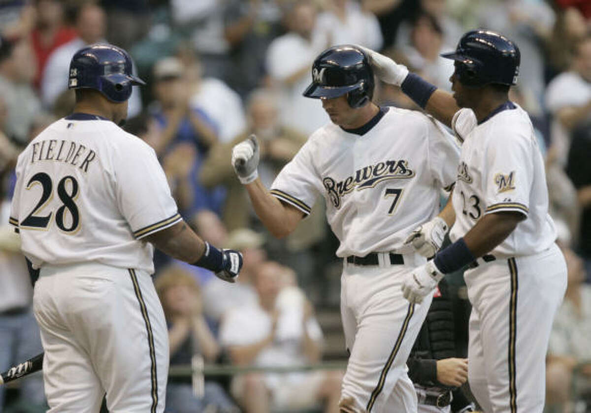 BREWERS BUMP ASTROS FROM FIRST