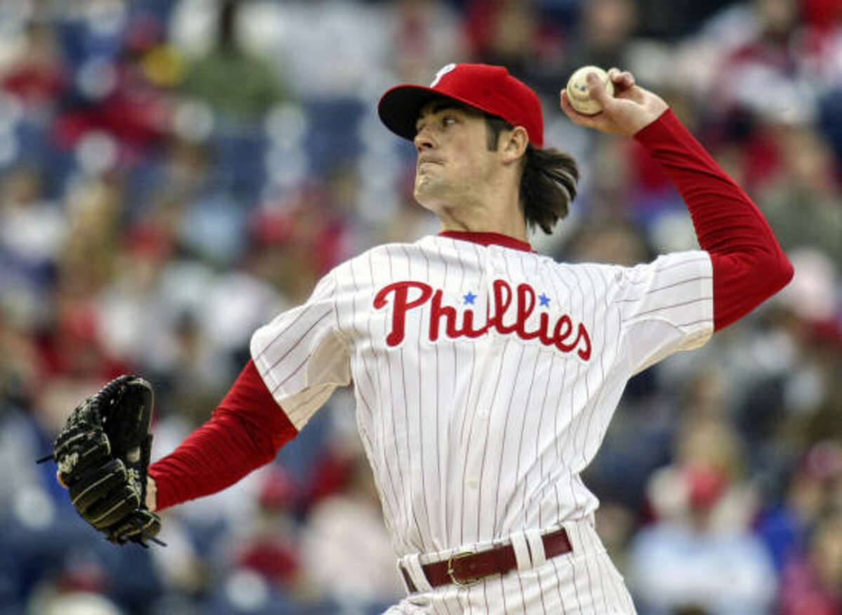 Cole Hamels allowed five runs and eight hits in six innings for his first win as a starter.