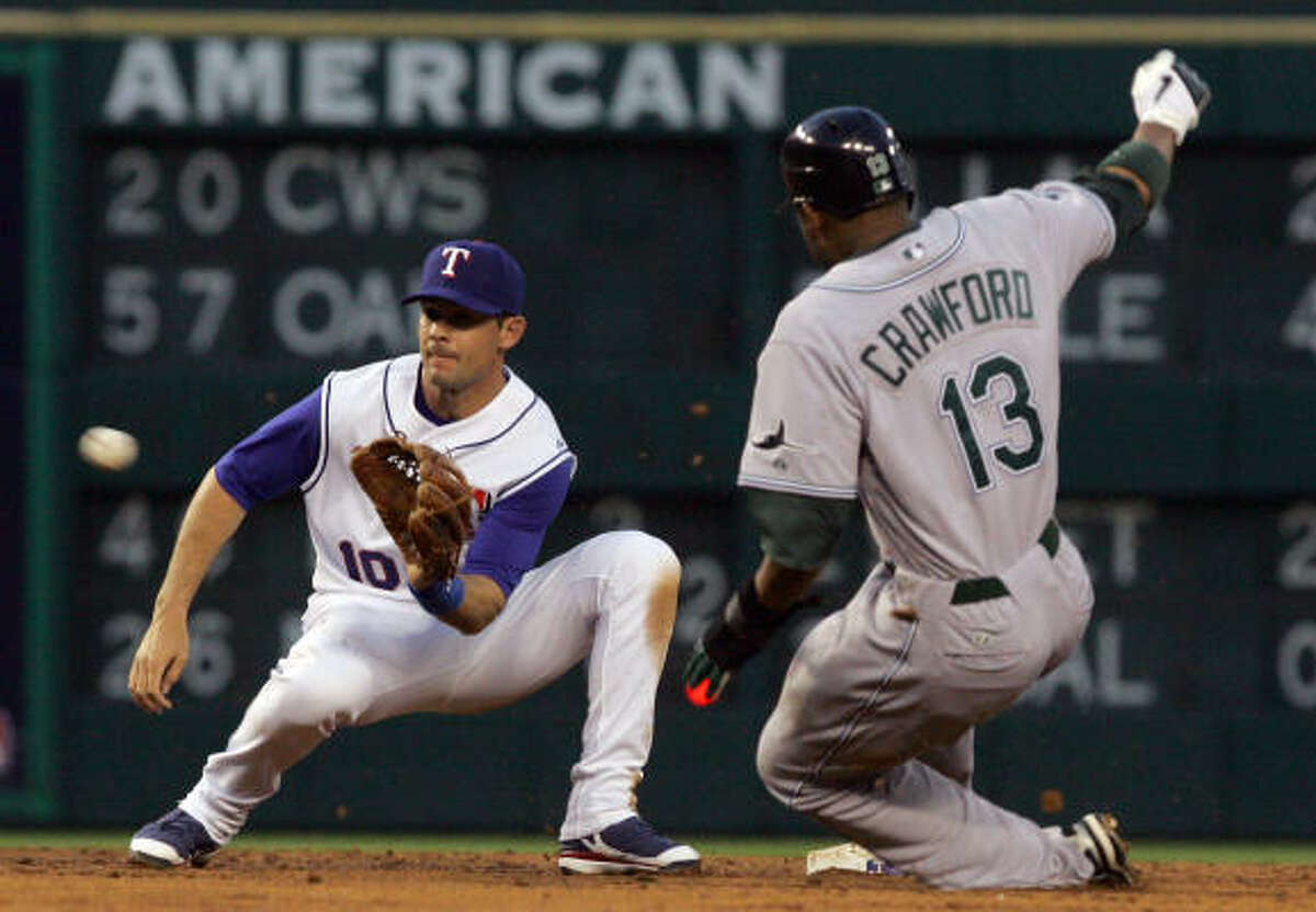 Former player, Carl Crawford of the Tampa Bay Rays throws out a News  Photo - Getty Images