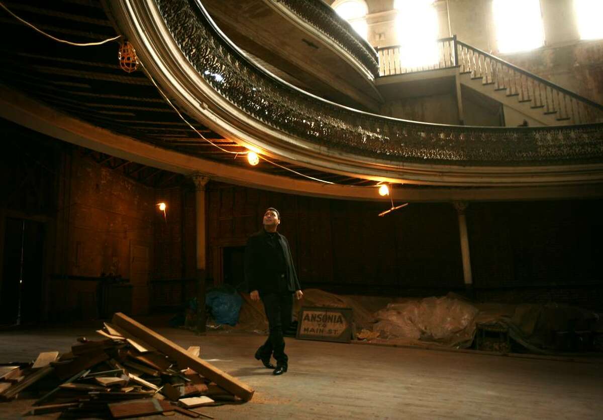 Opera singer Roberto Iarussi checks out the Sterling Opera House on Elizabeth Street in Derby, Conn, on Wednesday, October 14, 2009. Iarussi was starring in a promotional video for his upcoming performance at Griffin Hospital's Centennial Gala on Saturday, October 24.