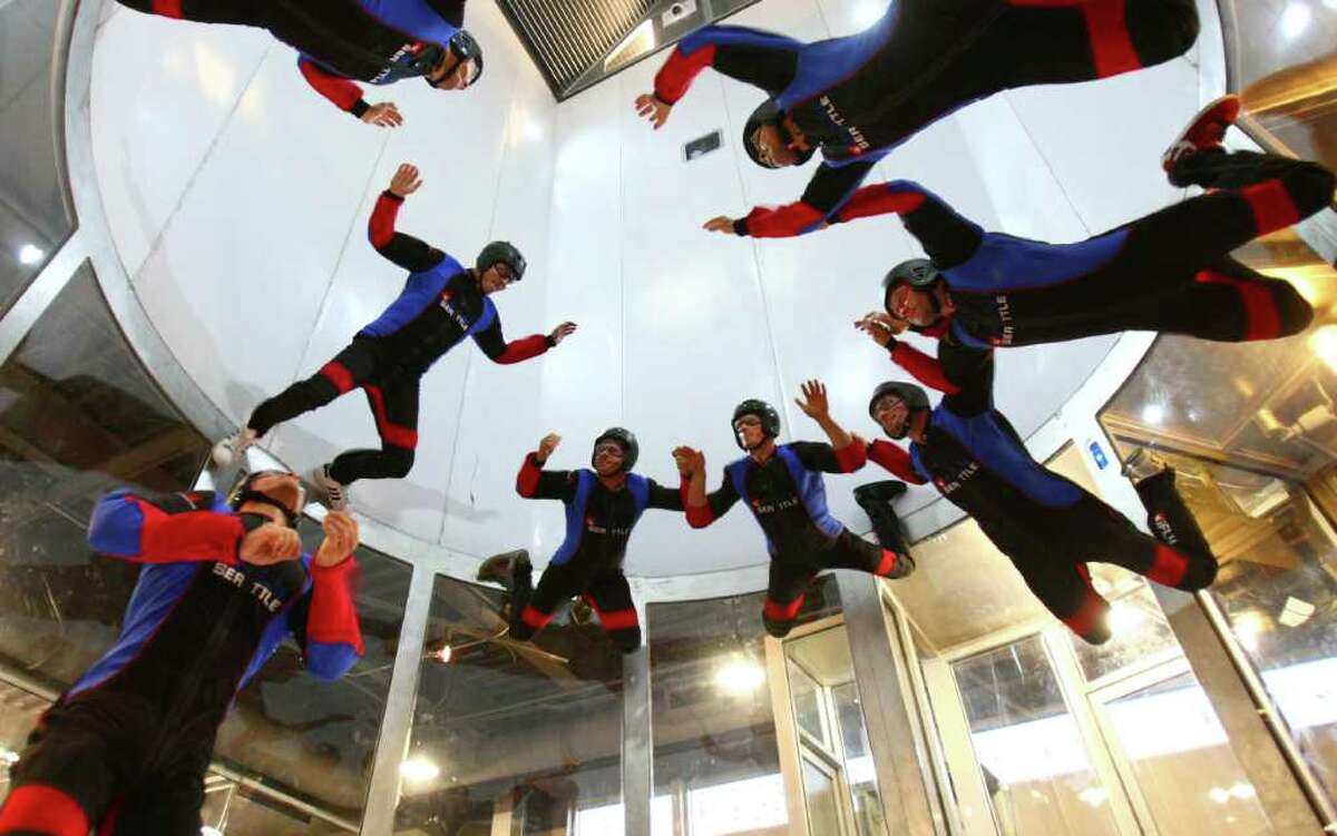 iFly Seattle indoor skydiving instructors prepare for the public opening of the indoor skydiving facility on Friday, August 12, 2011 in Tukwila. Flyers enter a wind tunnel powered by four massive fans in the ceiling. The wind provides lift to flyers in the tunnel.