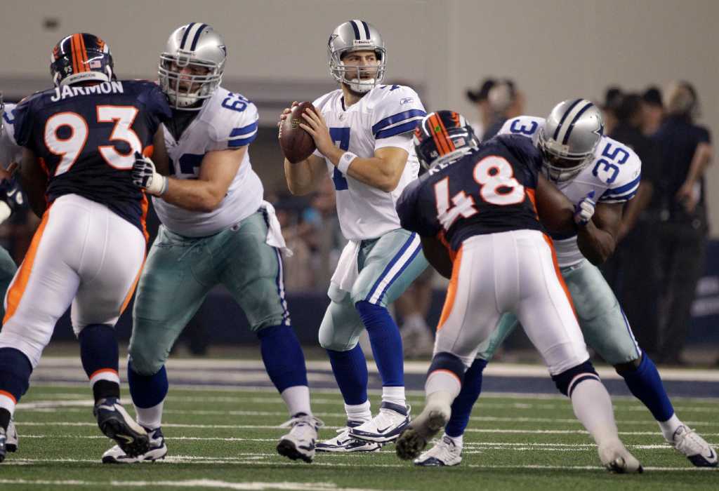 Dallas Cowboys quarterback Stephen McGee (7) is hit as he tries to throw by Houston  Texans defensive tackle Malcolm Sheppard (67) during the fourth quarter of  an NFL preseason football game Saturday