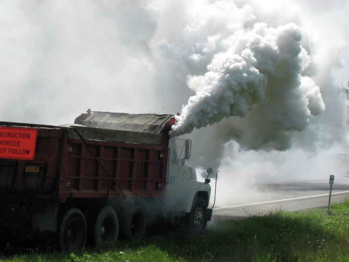 Photos Truck sends smoke billowing over Northway