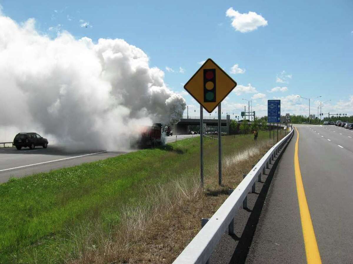 Photos Truck sends smoke billowing over Northway