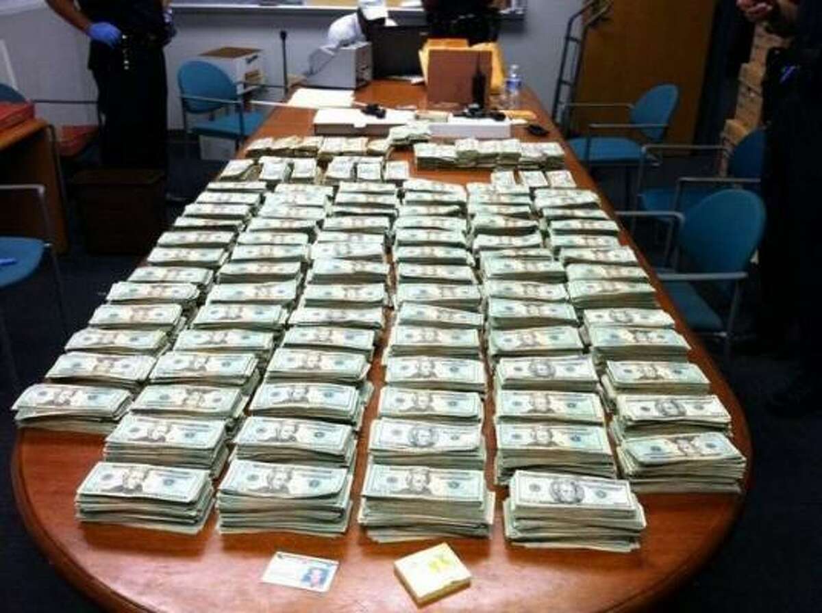 Police in Wilmington, Del., arrested John Kennedy on Saturday and found this money in his vehicle and a storage facility.