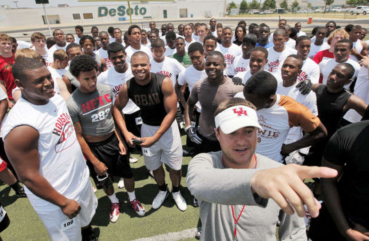 College football camps travel state to attract talent