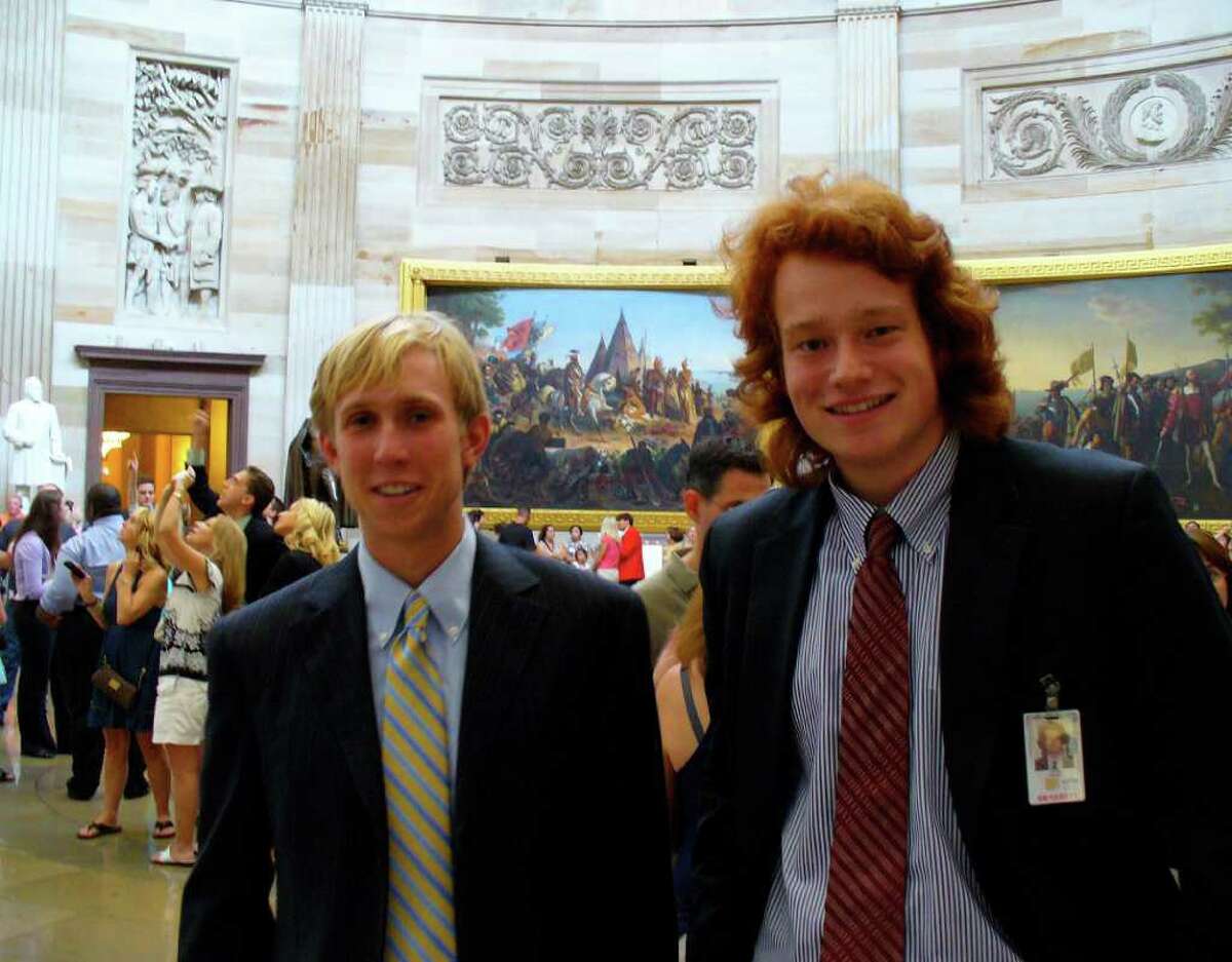 Chris Baldock, left, an intern in office of Sen. Richard Blumenthal, D-Conn., and Alex Bulazel, an intern with Rep. Mike Kelly, R-Pa., 2010 graduates from the Brunswick School in Greenwich, in the Capitol Rotunda in Washington, D.C.
