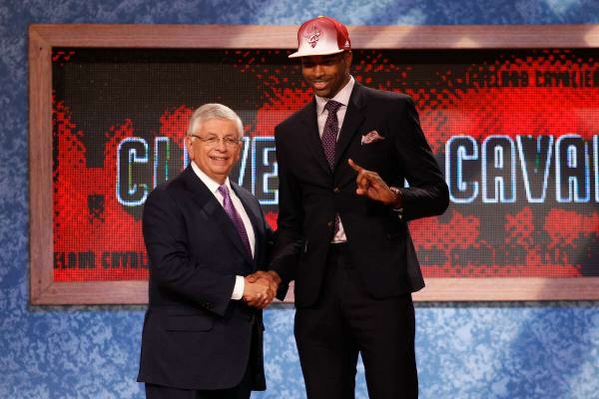 Texas' Tristan Thompson poses with NBA commissioner David Stern after he was drafted No. 4.