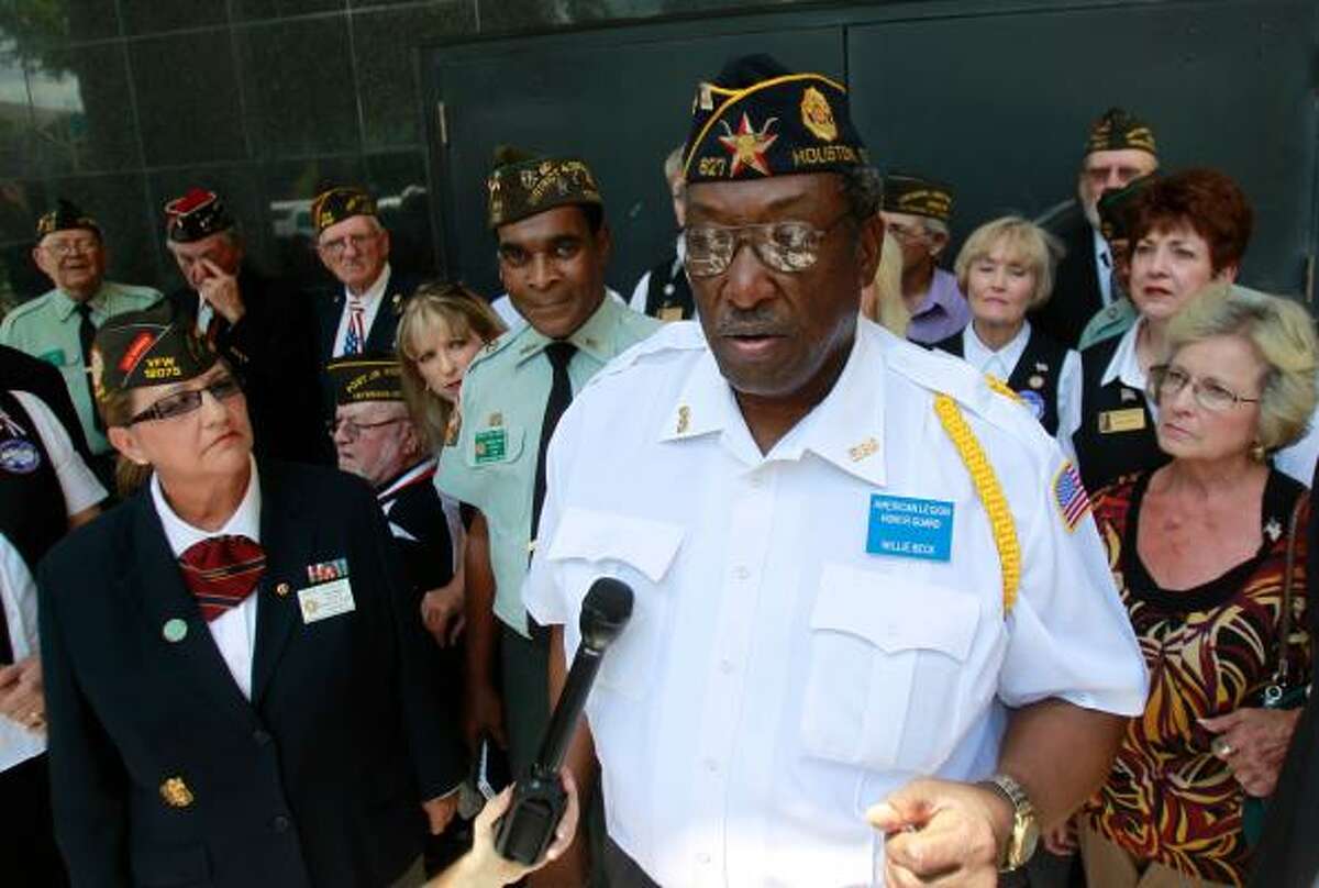 American Legion member Willie Beck discusses the federal lawsuit against the Houston National Cemetery and the VA after a hearing on Tuesday before U.S. District Judge Lynn Hughes.