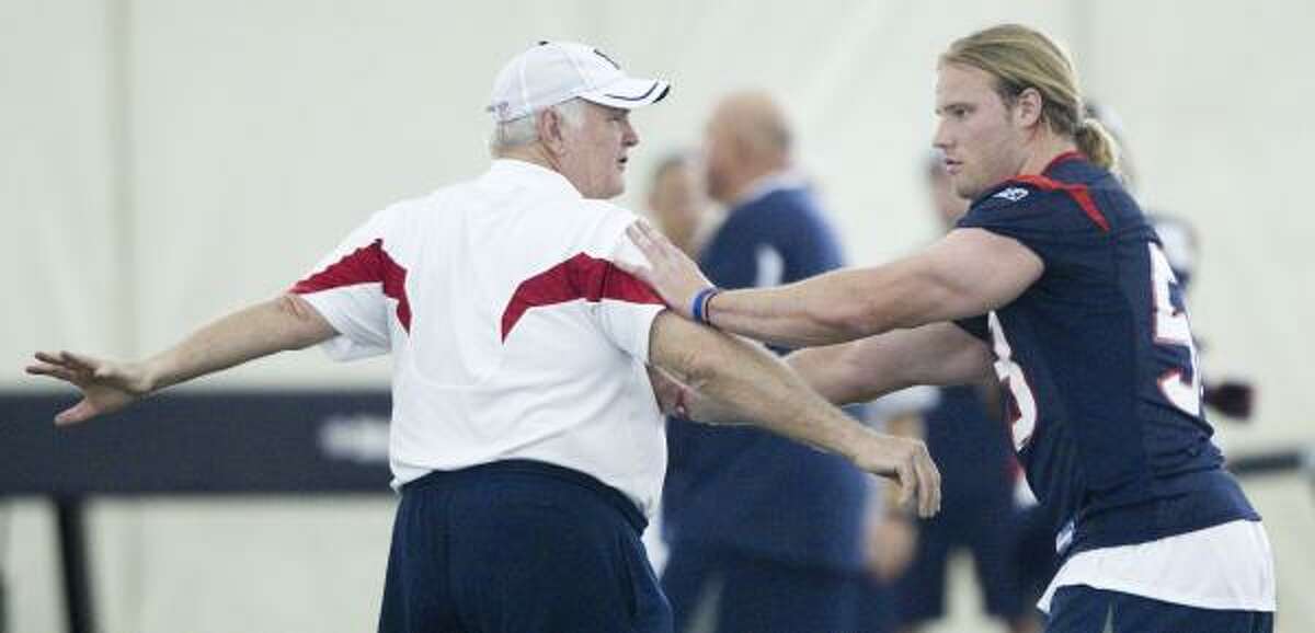 Wade Phillips, left, would love for Brooks Reed, right, to resemble Clay Matthews on the field at some point.