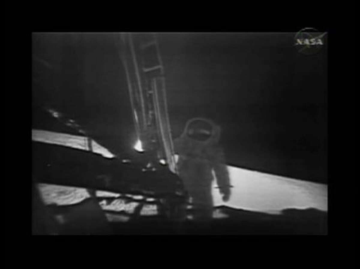 This photo, from NASA TV, shows one of the Apollo 11 astronauts on the lunar surface after landing from a new digitally refurbished version of the original moon landing video unveiled in Washington Thursday, July 16, 2009.