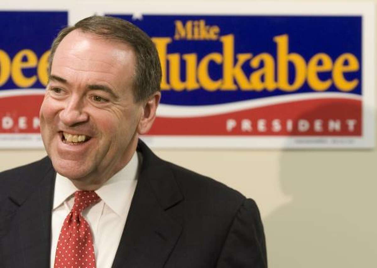 Former Arkansas Gov. Mike Huckabee may not have gotten much endorsement juice from the Boogey Woogers. But at least he got to strap on a bass and rock out with them during this rally on January 1, 2008 in Des Moines, Iowa.