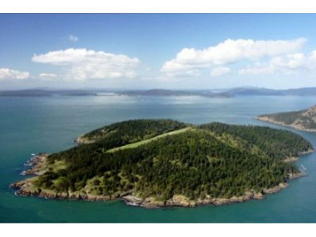If the recent lousy economic news has you wanting to flee to a private island, Paul Allen has one to sell you. Allan Island (named after a Navy hero) is 292 acres southwest of Anacortes,between Burrows Bay and Rosario Strait. Allen bought it in 1992 with a plan to build a vacation home there, but subsequently opted to build on Lopez Island, where he bought 387 acres in 1996. Allen put the island up for sale for $25 million on 2005. It's now listed for $13.5 million. The Island features a log home, airstrip, dock, beaches and 44 tax lots. Here are some more pictures of Allan Island, followed by some other islands for sale across the country. (Listing: www.windermere.com/index.cfm?fuseaction=listing.listingDetailUpdated&listingID=18537393)