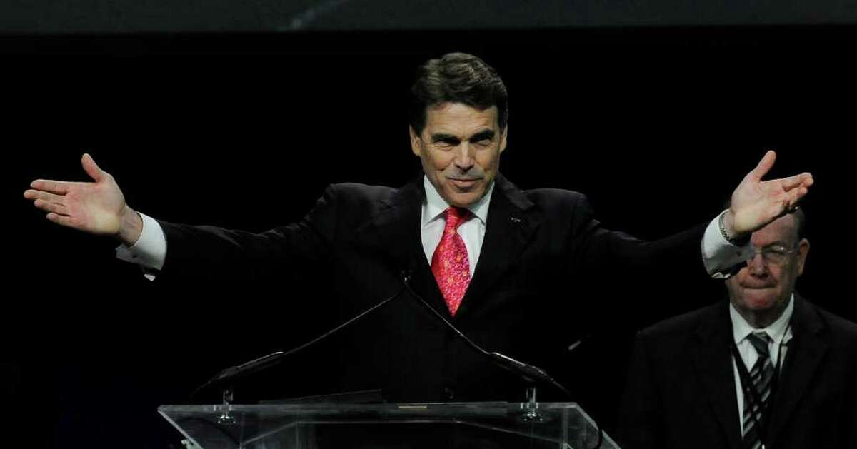 Gov. Rick Perry speaks at the closing of The Response, a daylong prayer rally and fast Aug. 6 at Houston’s Reliant Stadium. Event organizer Don Wildmon is calling on attendees to help register millions of conservative Christians to vote.