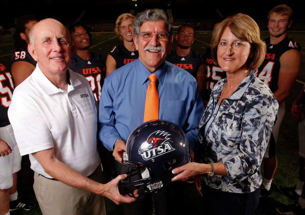 UTSA President Ricardo Romo (center) is joined by football head coach Larry Coker (left) and athletic director Lynn Hickey (right) for a portait on Media Day for the UTSA football program at the Alamodome on Friday, August 19, 2011. Kin Man Hui/kmhui@express-news.net