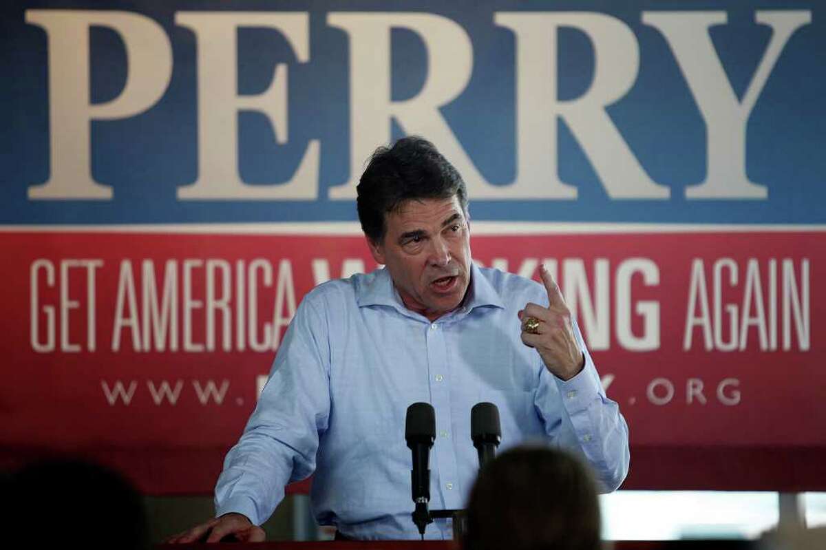 Metro - Governor Rick Perry speaks during his Welcome Home Rally at Abel's on the Lake in Austin on Saturday, August 20, 2011. LISA KRANTZ/lkrantz@express-news.net