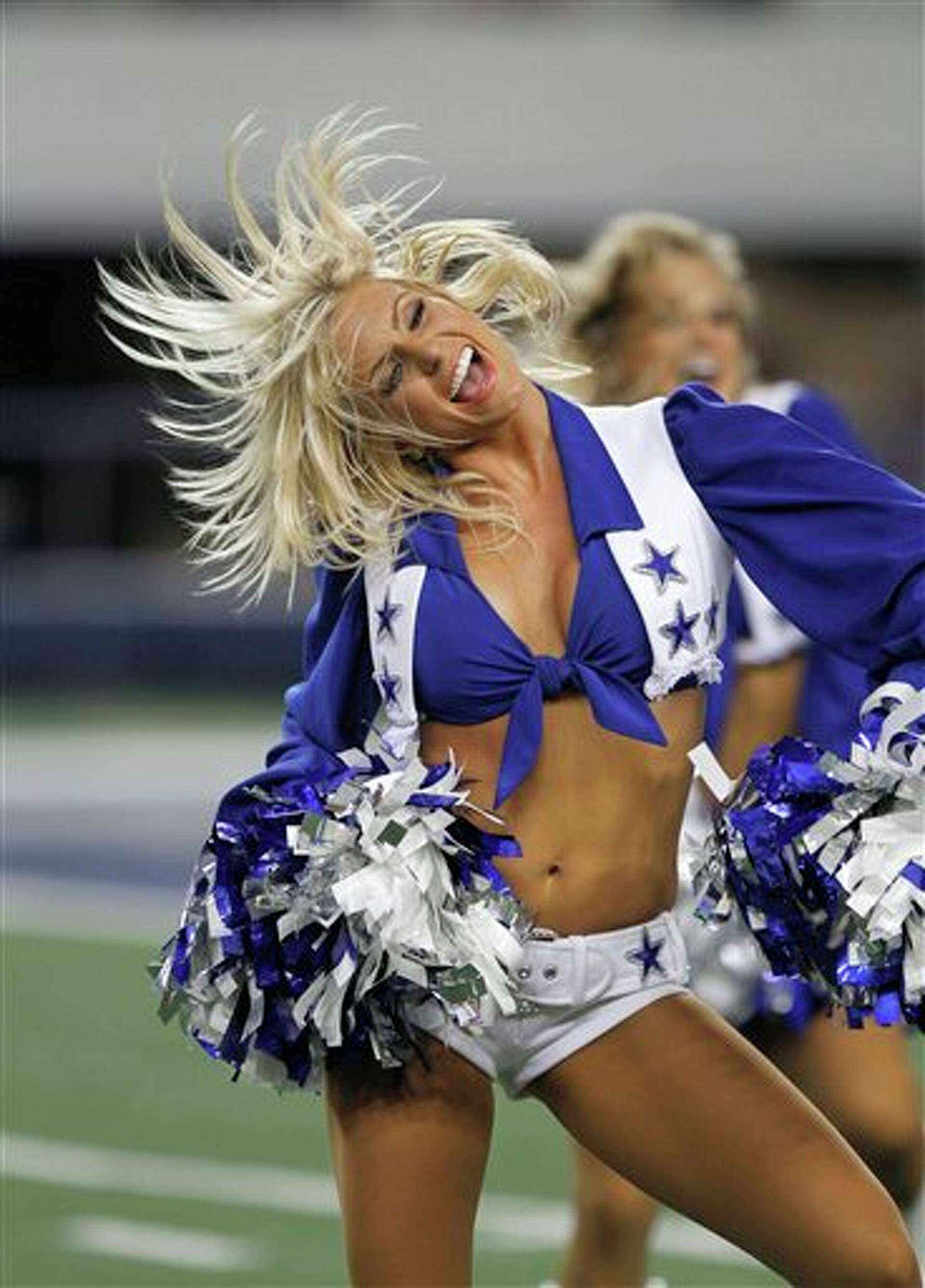 Dallas Cowboys Cheerleaders slip on swimsuits for upcoming calendar photo  shoot