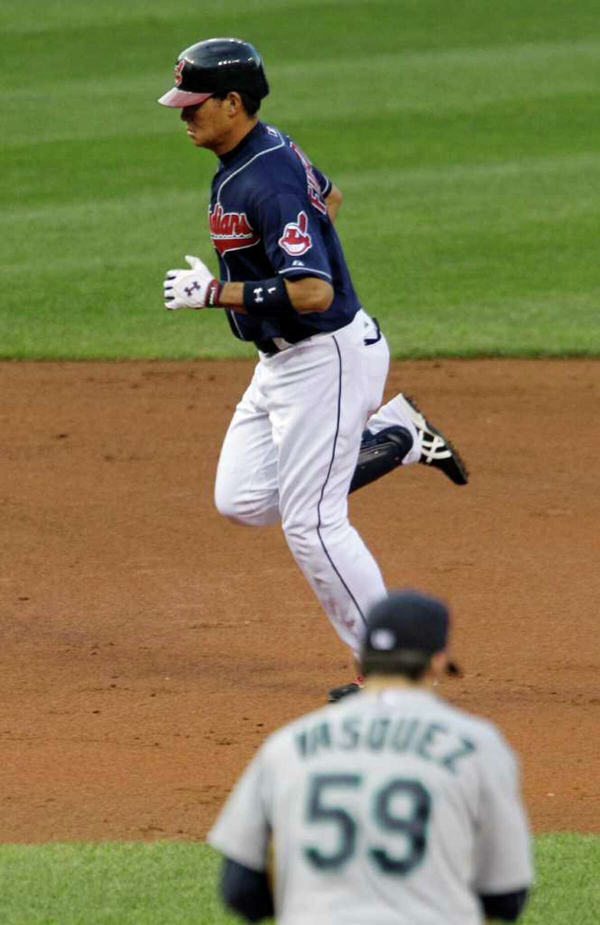 Cleveland Indians' Kosuke Fukudome, from Japan, rounds the bases after a solo home run off Seattle Mariners starting pitcher Anthony Vasquez (59) in the second inning of the second game of a baseball doubleheader Tuesday, Aug. 23, 2011, in Cleveland.