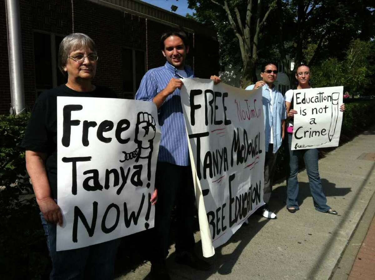 A group of protesters gathers outside state Superior Court in Norwalk, Conn. on Wednesday, August 24, 2011 to support Tanya McDowell, the Fairfield County woman facing larceny and drug-dealing charges. Chris Hutchinson, second from left, is the founder of the group, which is calling itself the Committee to Defend Tanya McDowell.