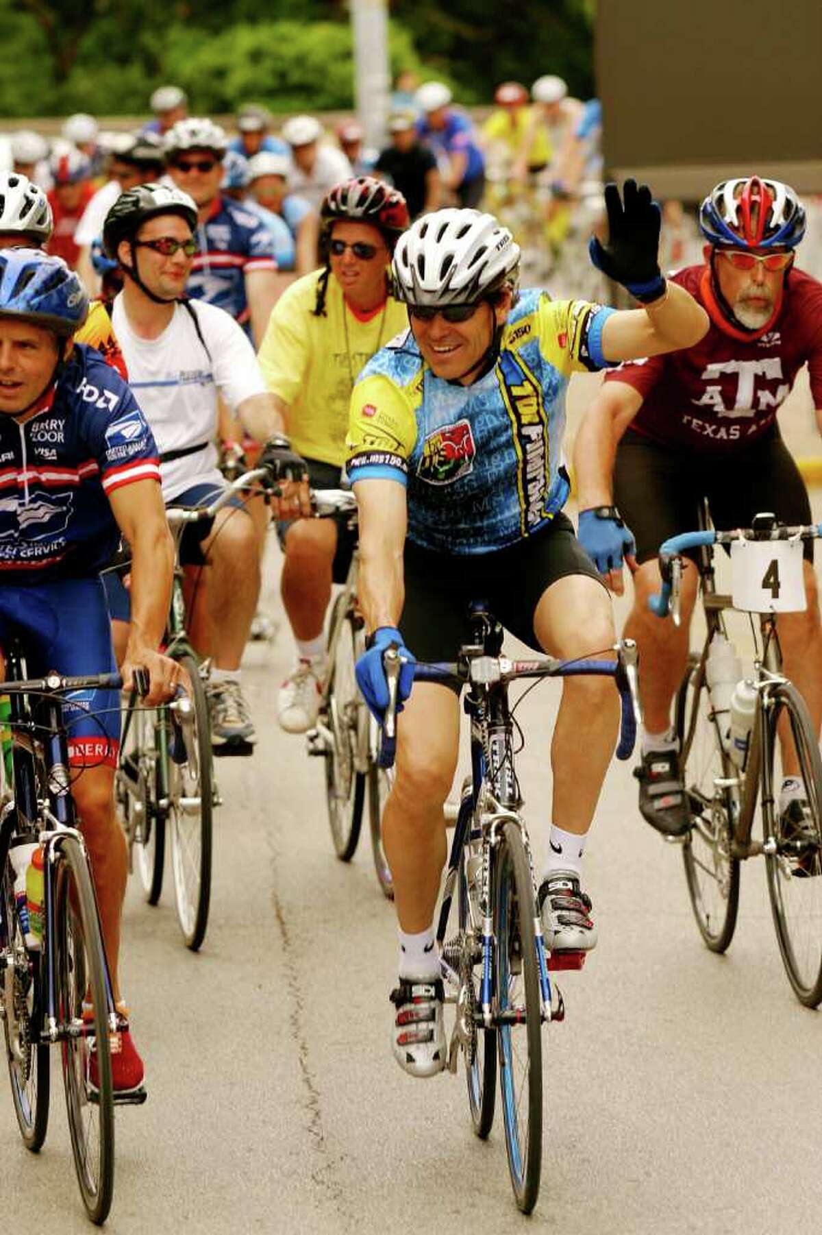 Texas Gov. Rick Perry is always on the move. AUSTIN, TX - APRIL 18: Texas Governor Rick Perry (C) rides during the final leg of the 20th annual BP MS 150 April 18, 2004 in Austin, Texas. Over 13,000 people participated in the two-day event travelling from Houston to Austin.