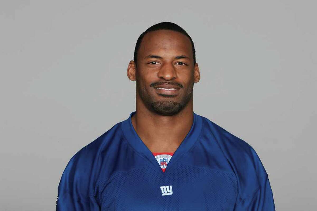 EAST RUTHERFORD, NJ - 2007: Reggie Torbor of the New York Giants poses for his 2007 NFL headshot at photo day in East Rutherford, New Jersey. (Photo by Getty Images)