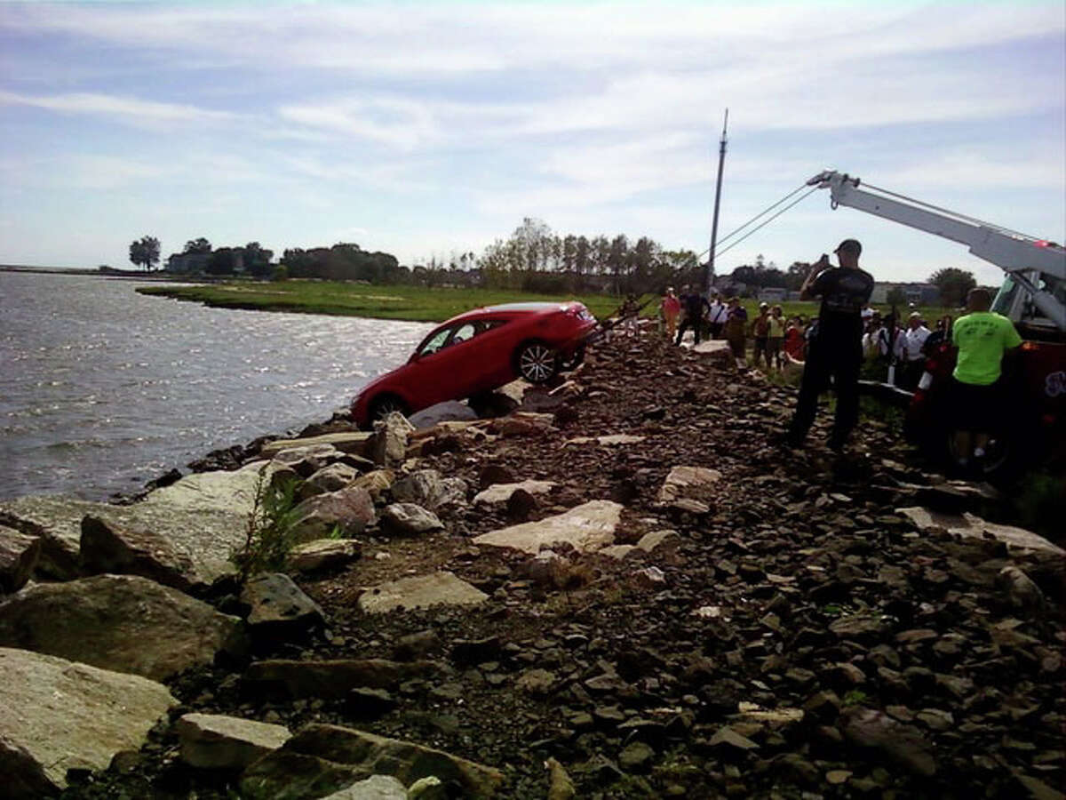 Bridgeport zoning director helps save man after car plunges into Long