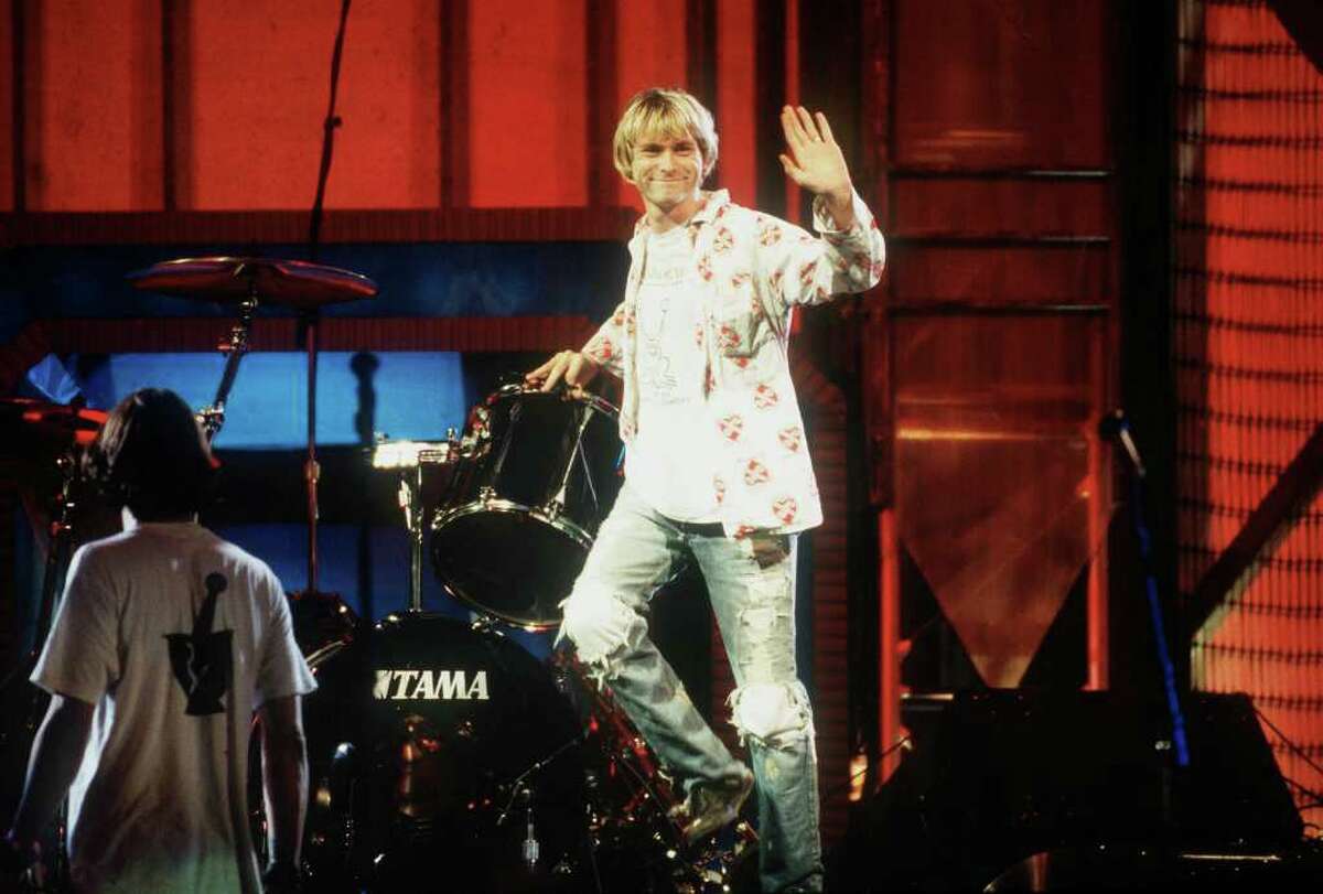 1992: Though they had been expressly forbidden by VMA producers, Nirvana  opened their 1992 performance with unreleased song "Rape Me"...and it wasn't caught by censors. Near the end of the performance, bassist Krist Novoselic threw his bass guitar in the air and attempted to catch it, only to have the guitar come crashing down on his head.