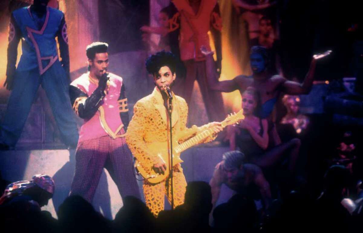 1991: During his performance of "Gett Off," Prince revealed a surprise to the audience: his bare bottom, exposed through a cut-out in the yellow costume.