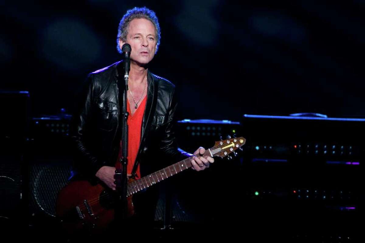 FILE - In this March 19, 2009 file photo, Lindsey Buckingham of Fleetwood Mac performs at Madison Square Garden in New York. Buckingham says the band is likely to tour and record a new album soon. (AP Photo/Charles Sykes, file)