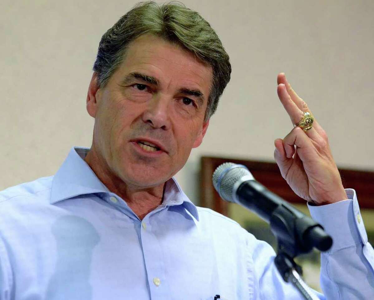 Gov. Rick Perry speaks to supporters at Tommy's Ham House in Greenville, S.C. (AP Photo/Richard Shiro)