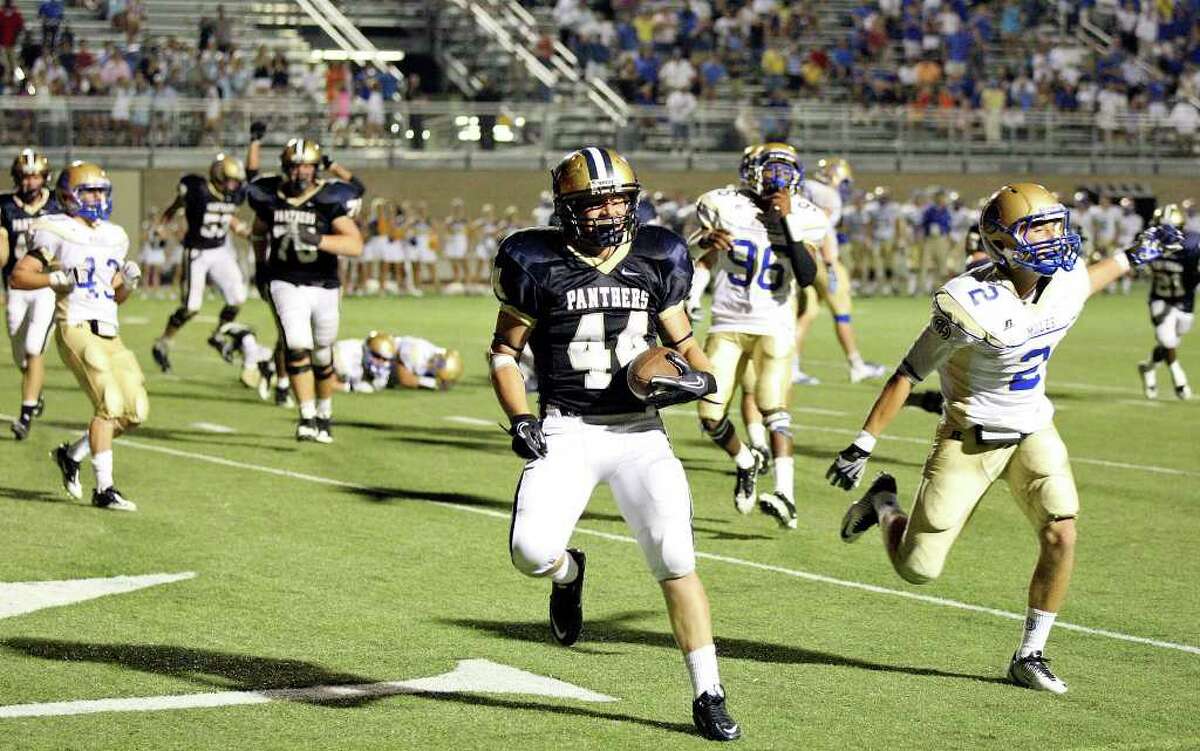 O'Connor's Billy Craft runs through the end zone after catching the 2-point-conversion pass in double overtime to beat Alamo Heights 28-27 Saturday Aug 27, 2011 at Farris Stadium.
