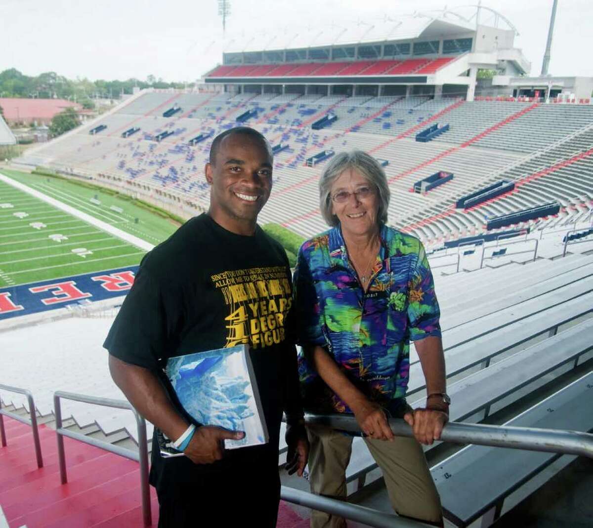 University of Mississippi football player Devin Thomas with geology instructor Cathy Grace at Vaught-Hemingway Stadium in Oxford, Miss. on Wednesday, August 17, 2011. Photo by Bruce Newman