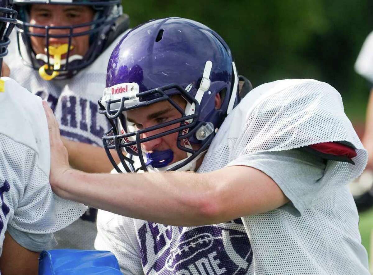 The Westhilll High School football team co-captain Seamus Ronan in action during practice at the school in Stamford, Conn., September 1, 2011.