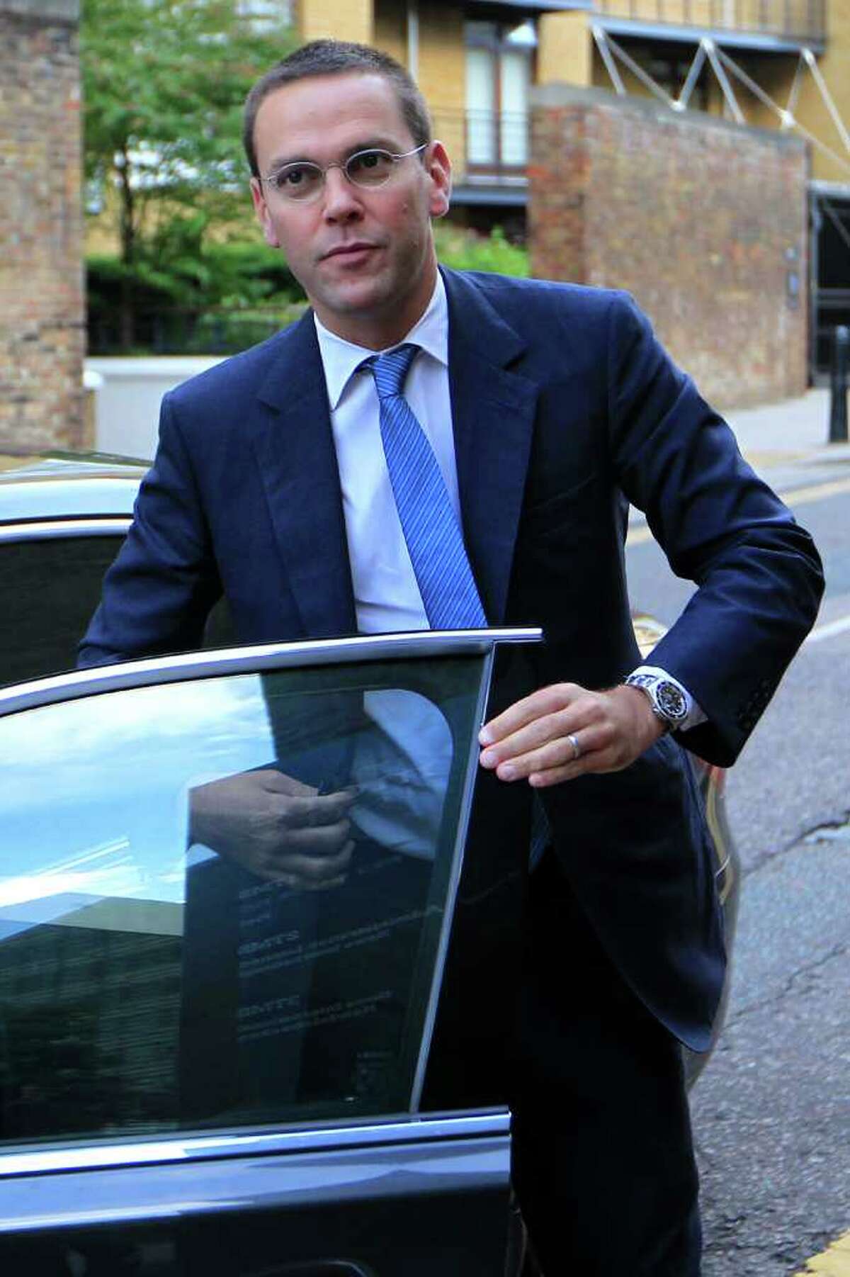 FILE - In this July 19, 2011 file photo, chief executive of News Corporation Europe and Asia, James Murdoch, arrives at the News International headquarters in London. A letter from former News of the World reporter Clive Goodman obtained by the Guardian says that phone hacking was widely discussed and expressly endorsed by senior journalists at the now-defunct tabloid. The newspaper said Tuesday, Aug. 16, 2011 that the letter - written by Goodman four years ago after he was released from prison - claimed that the illegal eavesdropping was carried out with "the full knowledge and support" of the paper's leadership. (AP Photo/Sang Tan, File)