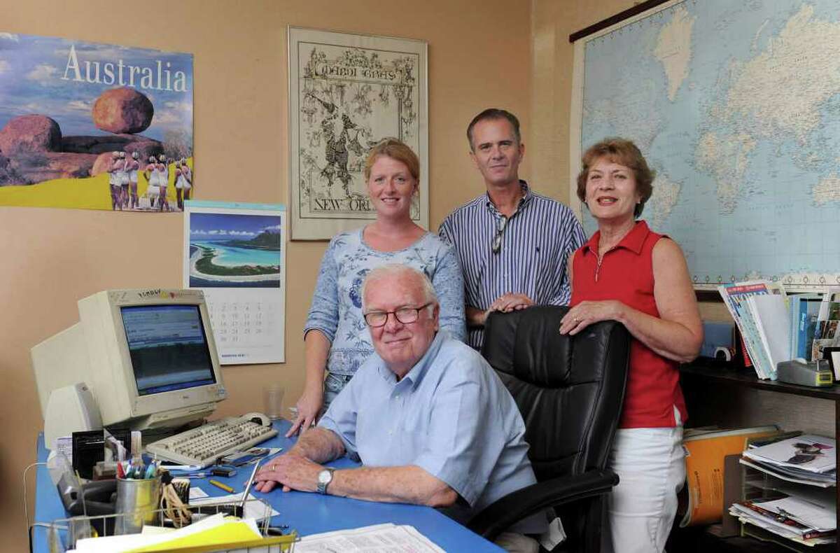 The staff of the Holton Travel Inc. on White Street in Danbury: Jerry Holton, founder, seated. From left, travel consultant Laura Luizzi, Tom Holton and Barbara Holton. Photo taken Wednesday, August 31, 2011.
