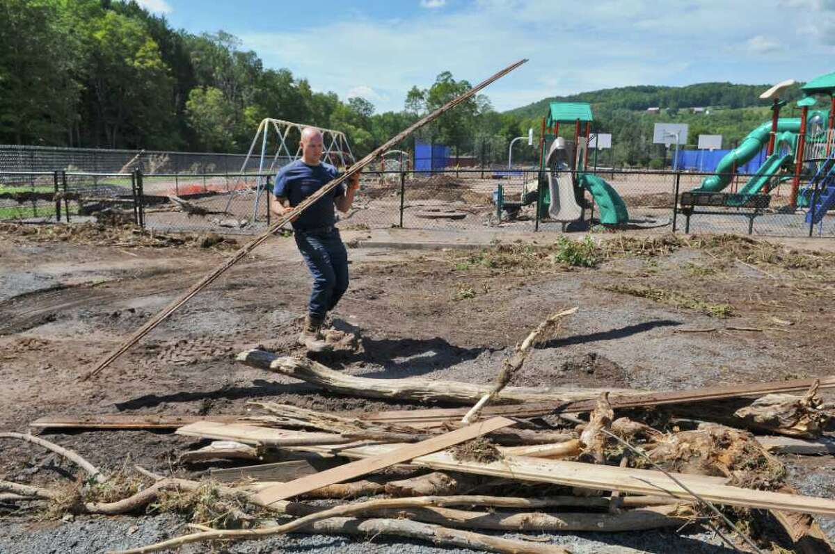 Schools rally towns hit by Irene