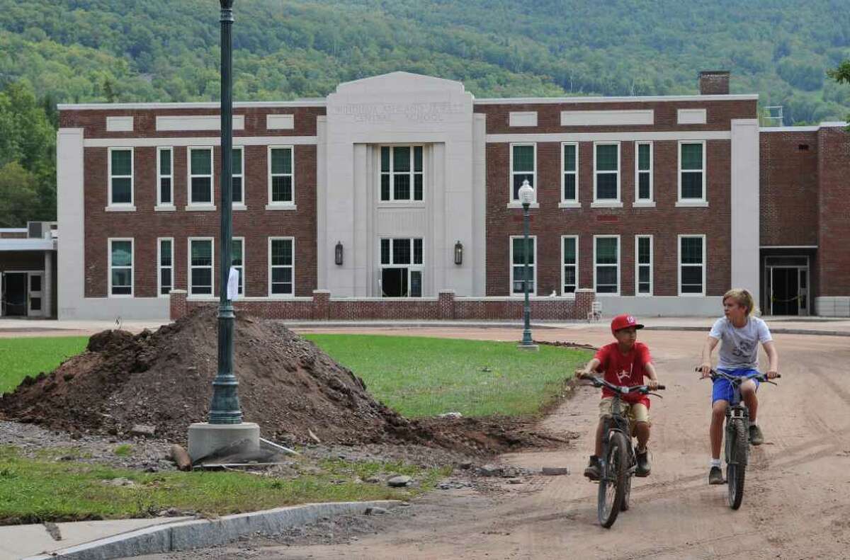 Schools rally towns hit by Irene