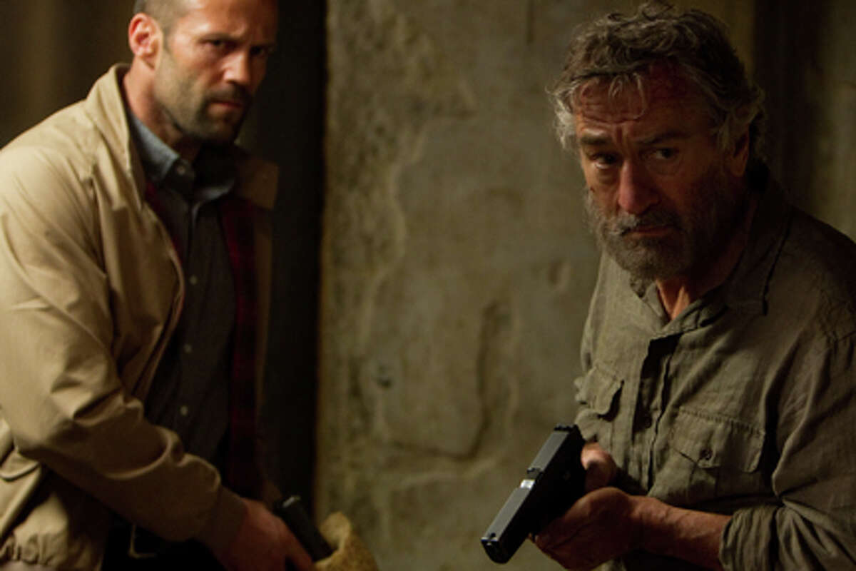 (L-R) Jason Statham as Danny Bryce and Robert De Niro as Hunter in "Killer Elite."