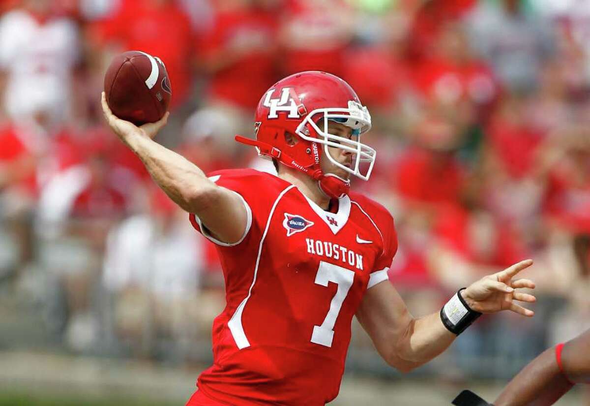 University of Houston quarterback Case Keenum looks to complete a pass.