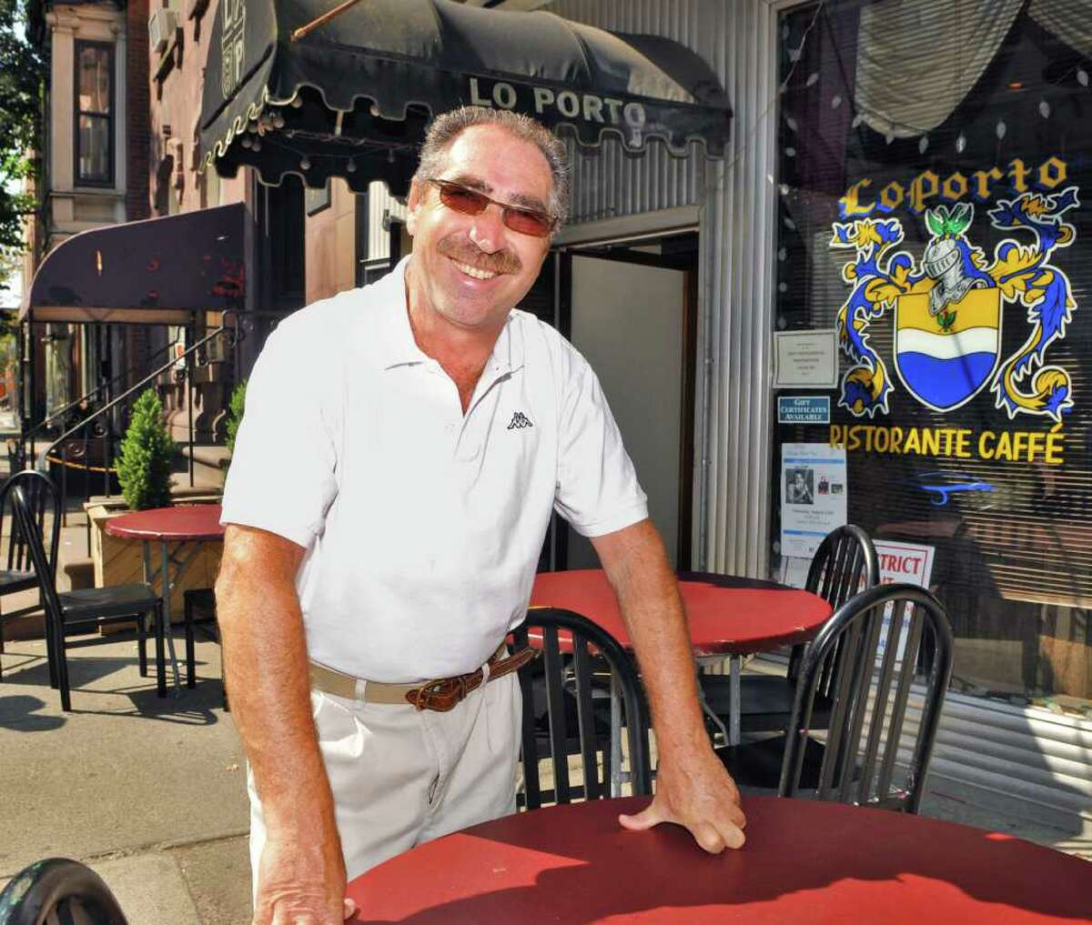 Michael LoPorto, outside LoPorto's Restaurant in Troy, Sept. 2, 2011, was long a familiar presence on Fourth Street holding court outside his restaurant, LoPorto Ristorante Caffee, known simply as LoPorto’s when he wasn’t inside cooking and chatting with patrons.