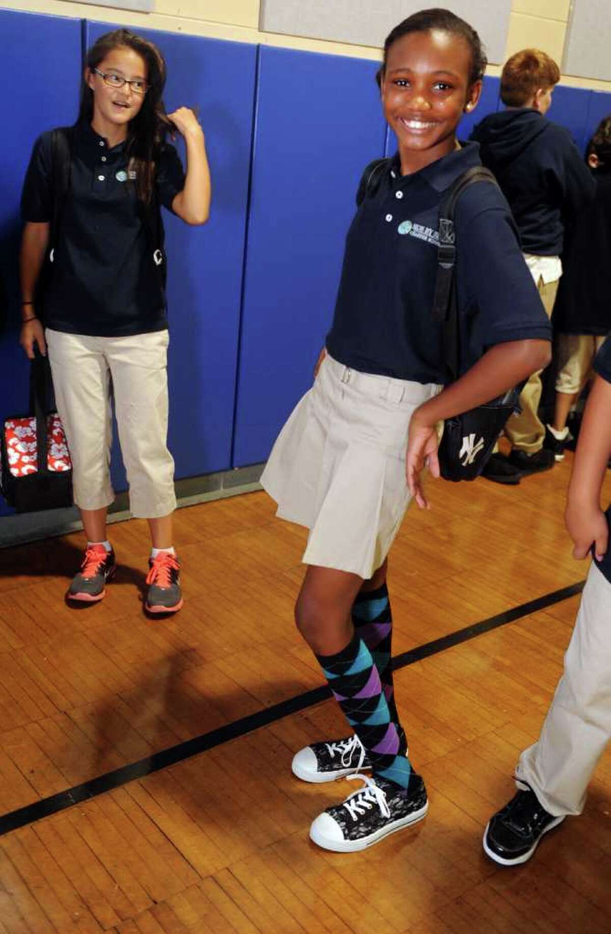 201112 school year brings new name, logo and uniform to Side by Side