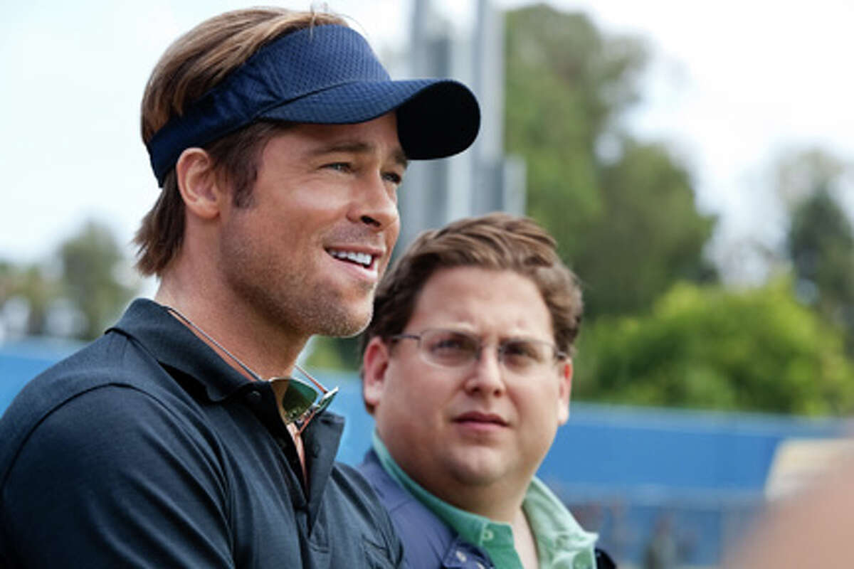 (L-R) Brad Pitt as Billy Beane and Jonah Hill as Peter Brand in "Moneyball."
