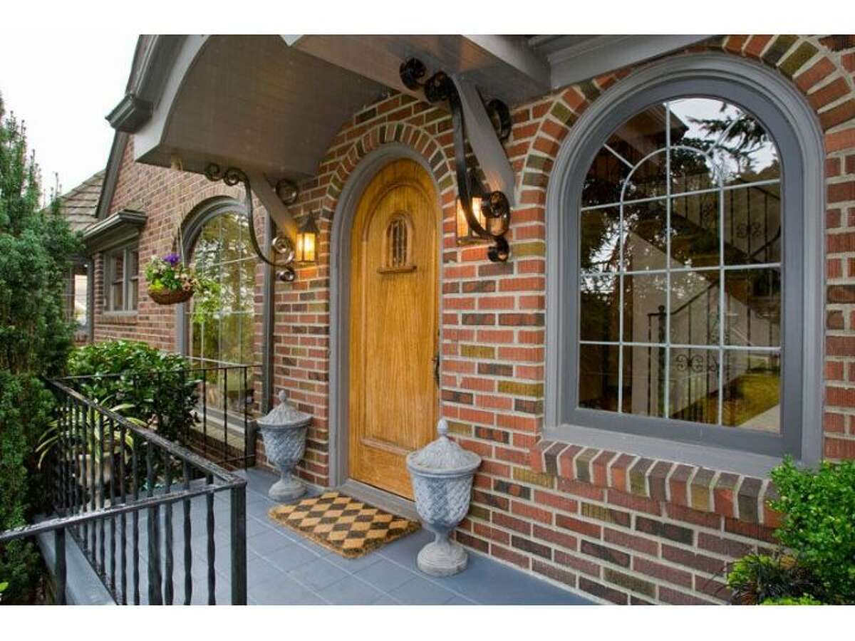 The entry of 915 W. Barrett St. The 3,500-square-foot house, built in 1927, has four bedrooms and three bathrooms, with huge, curved windows, exposed-wood moldings, window sills and doors, wrought-iron railings, built-in cabinets, marble-and-tile bathrooms and a finished lower level with a wine cellar. The 6,000-square-foot lot also has a two-car garage, treehouse and patio. It's listed for $1.13 million.