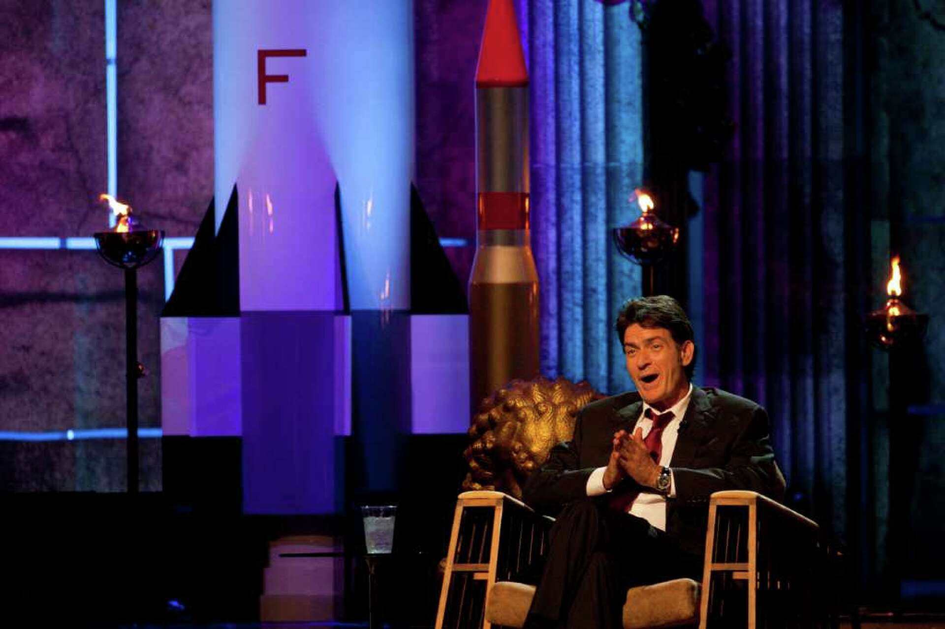 Charlie Sheen smiles through Comedy Central roast