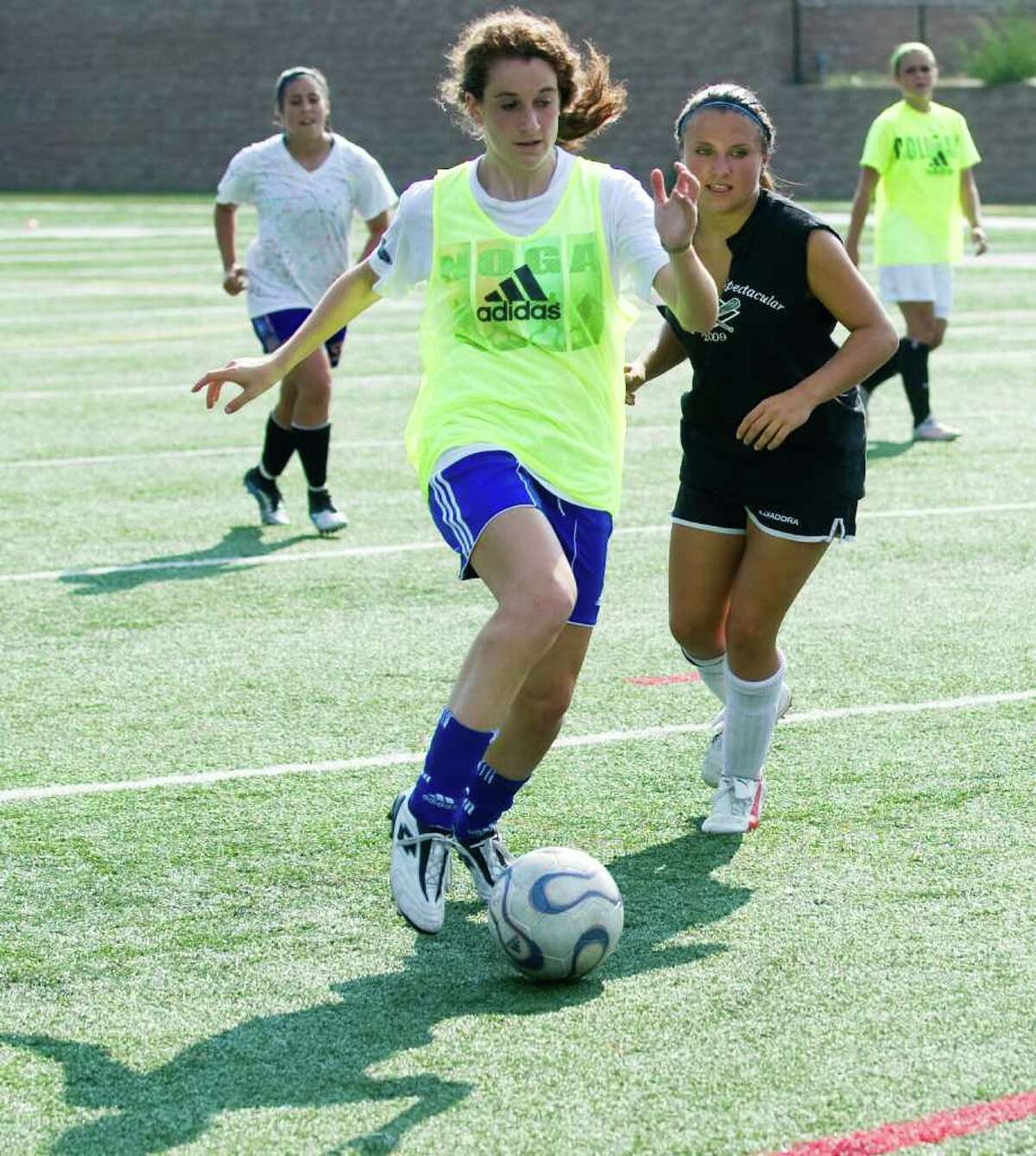 Julia Busto in action as the Westhill High School girls soccer team practices at the school in Stamford, Conn., September 12, 2011.