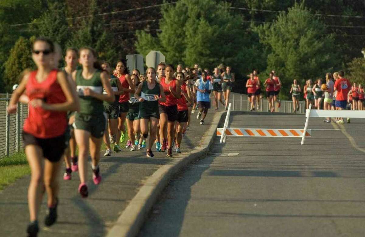 New Milford cross country teams sweep openingday showdown