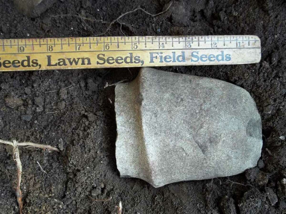 Tim Chaucer, director of the Milford Marine Institute, found a stone axe this summer in river silt in Milford. The axe is believed to be more than 2,000 years old, that he found